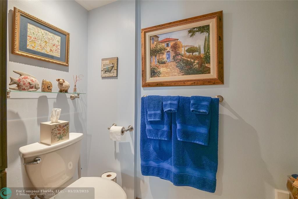 7300 Radice Court, Unit 302 Lauderhill, FL 33319 - Photo 29 of 81 a bathroom with a toilet and a shower