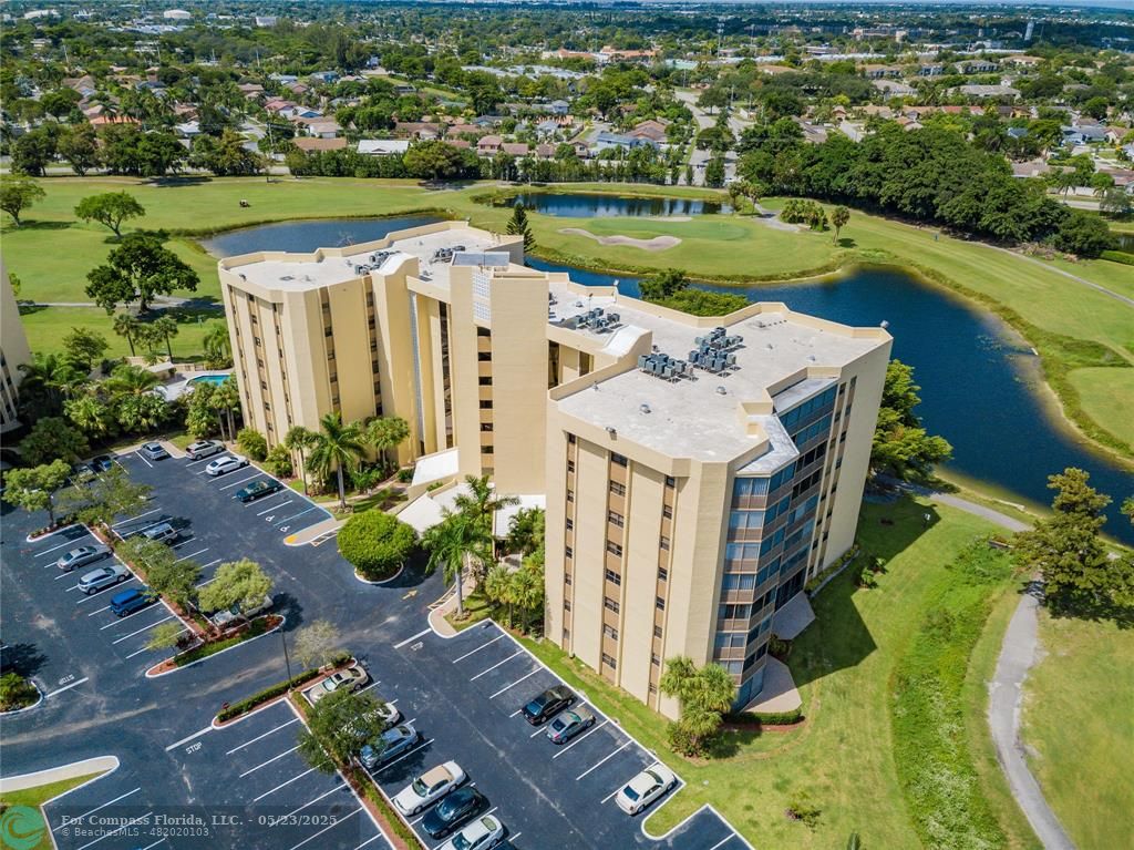 7300 Radice Court, Unit 302 Lauderhill, FL 33319 - Photo 44 of 81 an aerial view of a house with a ocean view