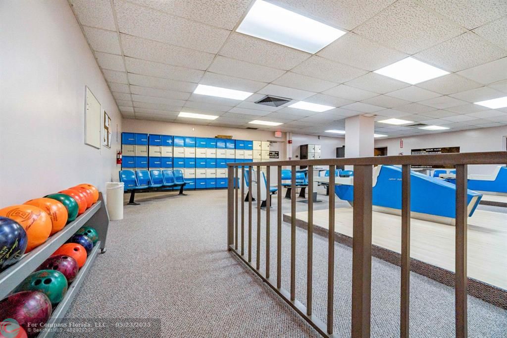 7300 Radice Court, Unit 302 Lauderhill, FL 33319 - Photo 48 of 81 a room with lots of furniture and toys