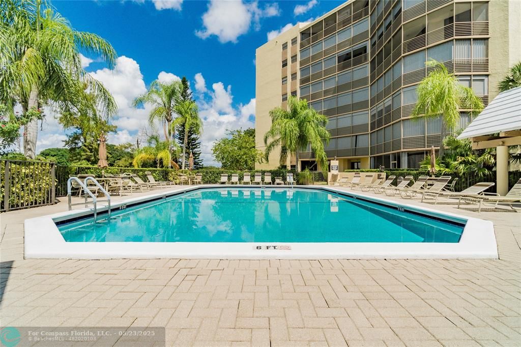 7300 Radice Court, Unit 302 Lauderhill, FL 33319 - Photo 59 of 81 a view of swimming pool on a patio