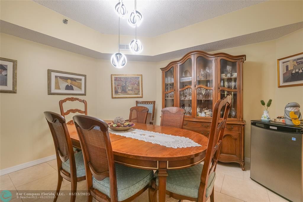 7300 Radice Court, Unit 302 Lauderhill, FL 33319 - Photo 10 of 81 a view of a dining room with furniture