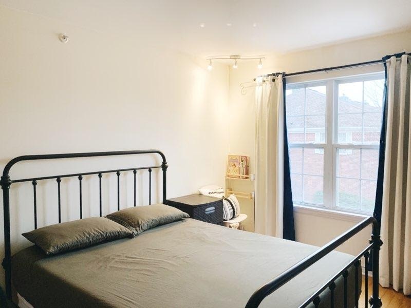 2367 Chelsea Road Northbrook, IL 60062 - Photo 5 of 8 a bedroom with a bed and a window