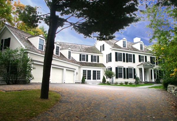 4 Lowerfield Road Weston, MA 02493 - Photo 1 of 20 a front view of a house with yard and green space