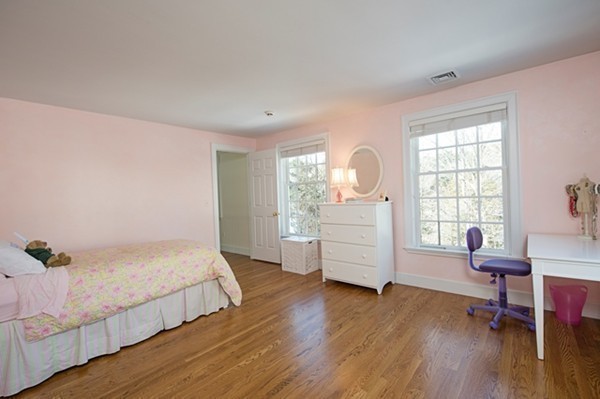 4 Lowerfield Road Weston, MA 02493 - Photo 13 of 20 a bedroom with furniture and a wooden floor