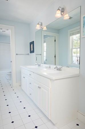 4 Lowerfield Road Weston, MA 02493 - Photo 15 of 20 a bathroom with a sink and a mirror