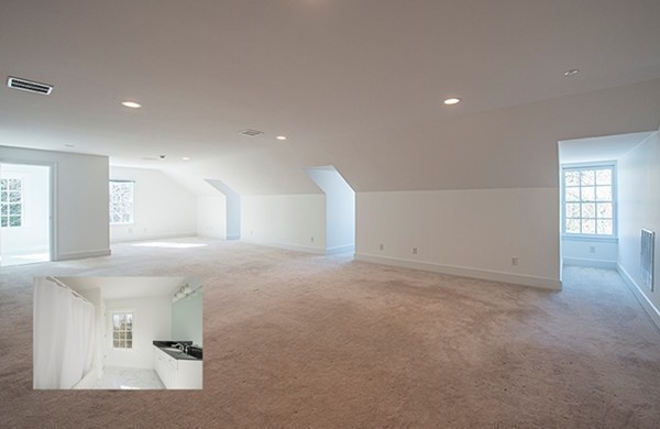 4 Lowerfield Road Weston, MA 02493 - Photo 17 of 20 a view of a livingroom with a fireplace