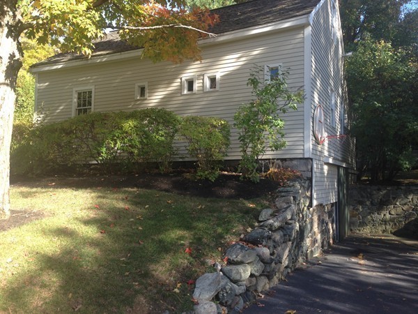 4 Lowerfield Road Weston, MA 02493 - Photo 18 of 20 a view of a back yard of the house