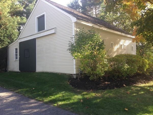 4 Lowerfield Road Weston, MA 02493 - Photo 19 of 20 a backyard of a house