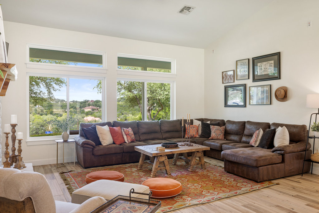 4607 R O Drive Spicewood, TX 78669 - Photo 18 of 40 a living room with furniture and a large window