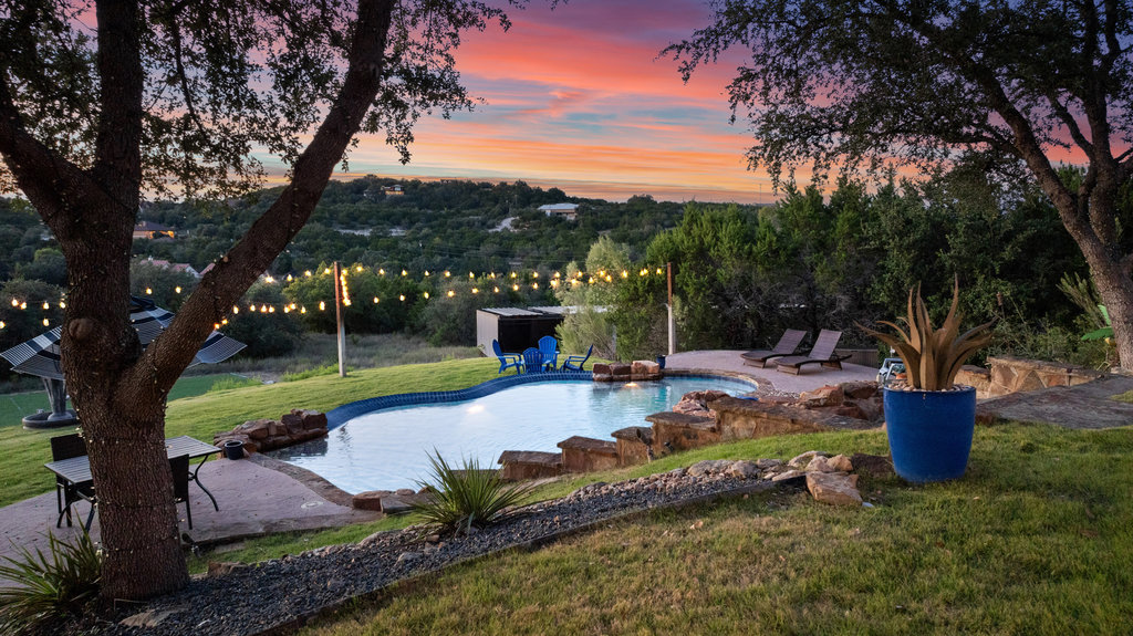 4607 R O Drive Spicewood, TX 78669 - Photo 2 of 40 a view of a garden with sitting area