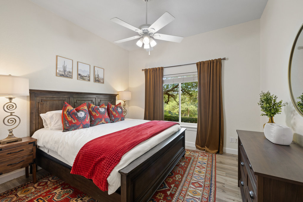 4607 R O Drive Spicewood, TX 78669 - Photo 24 of 40 a bed room with a bed and a window