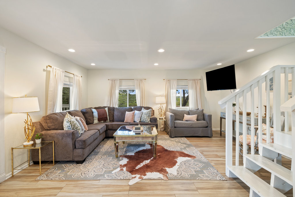 4607 R O Drive Spicewood, TX 78669 - Photo 29 of 40 a living room with furniture and a flat screen tv