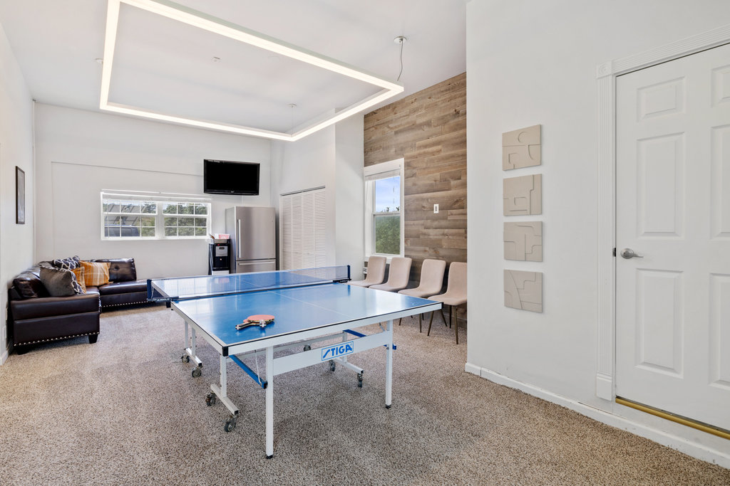 4607 R O Drive Spicewood, TX 78669 - Photo 33 of 40 a living room with furniture and a flat screen tv