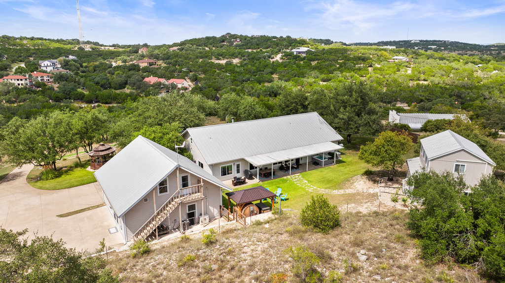 4607 R O Drive Spicewood, TX 78669 - Photo 9 of 40 an aerial view of residential houses with outdoor space and swimming pool