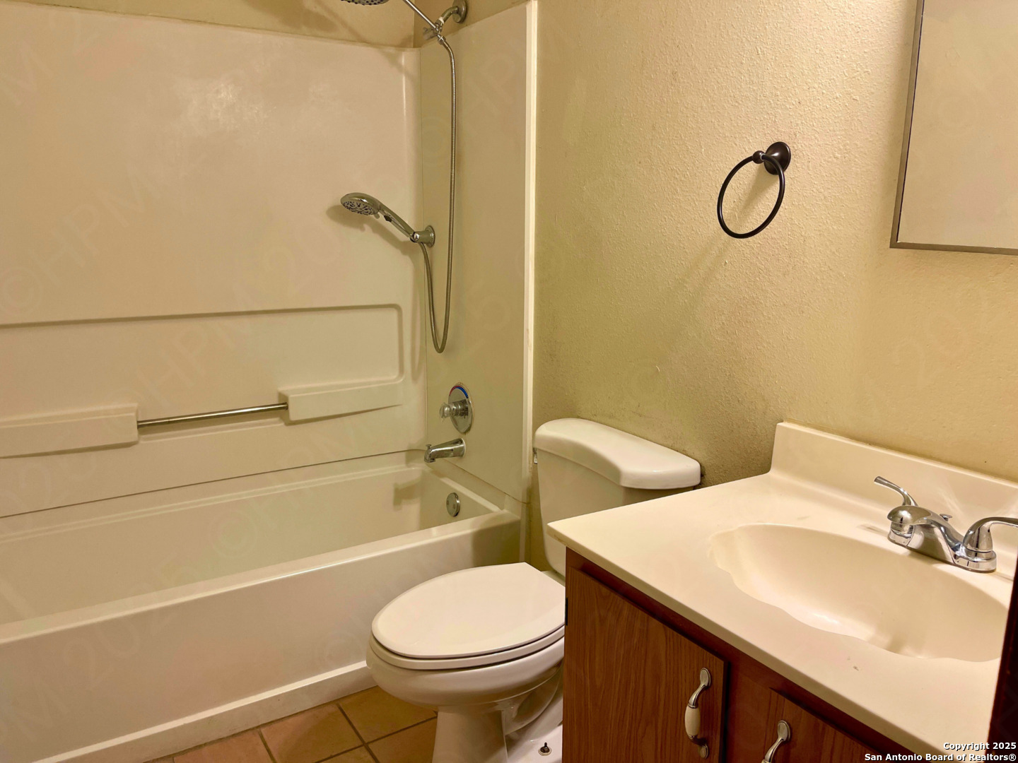 7318 Hunters Raven San Antonio, TX 78249 - Photo 11 of 18 a bathroom with a sink toilet and shower