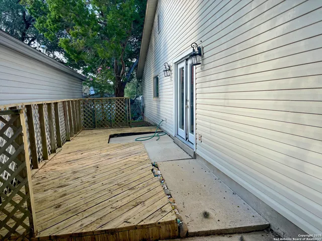 a view of a backyard with a deck