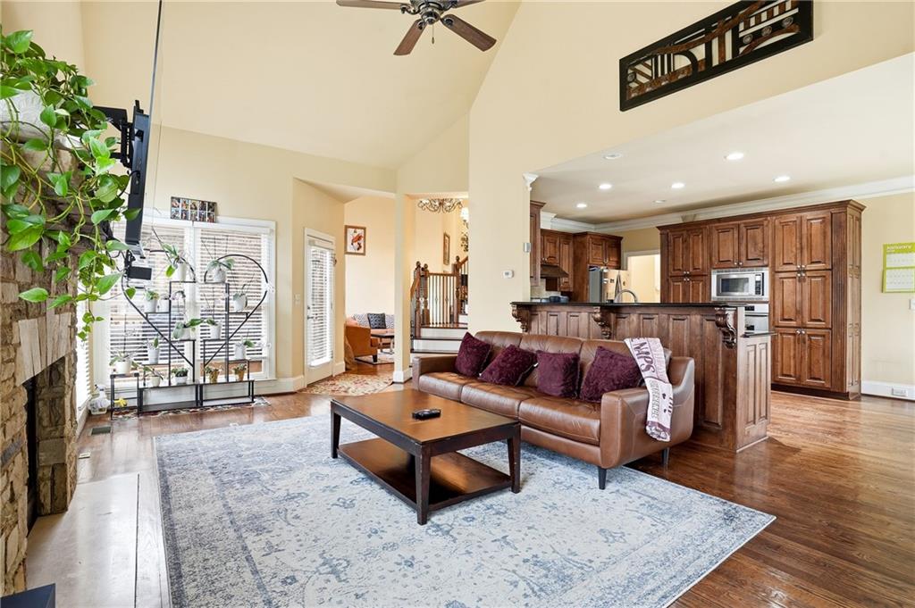 930 Old Tucker Road Stone Mountain, GA 30087 - Photo 19 of 47 a living room with furniture and a wooden floor
