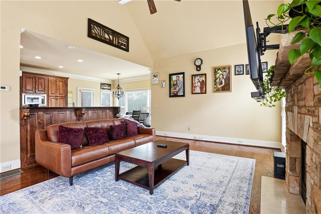 930 Old Tucker Road Stone Mountain, GA 30087 - Photo 20 of 47 a living room with furniture and a flat screen tv