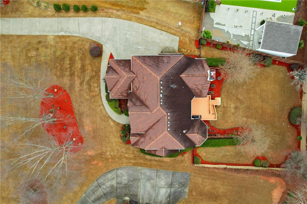 930 Old Tucker Road Stone Mountain, GA 30087 - Photo 7 of 47 an aerial view of a house with swimming pool