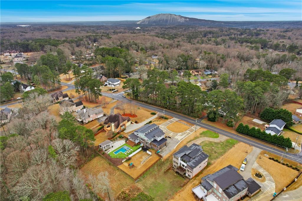 930 Old Tucker Road Stone Mountain, GA 30087 - Photo 10 of 47 an aerial view of residential houses with outdoor space