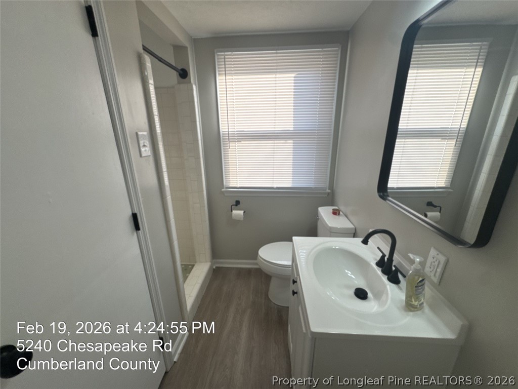 5240 Chesapeake Road Fayetteville, NC 28311 - Photo 19 of 20 a bathroom with sink and mirror