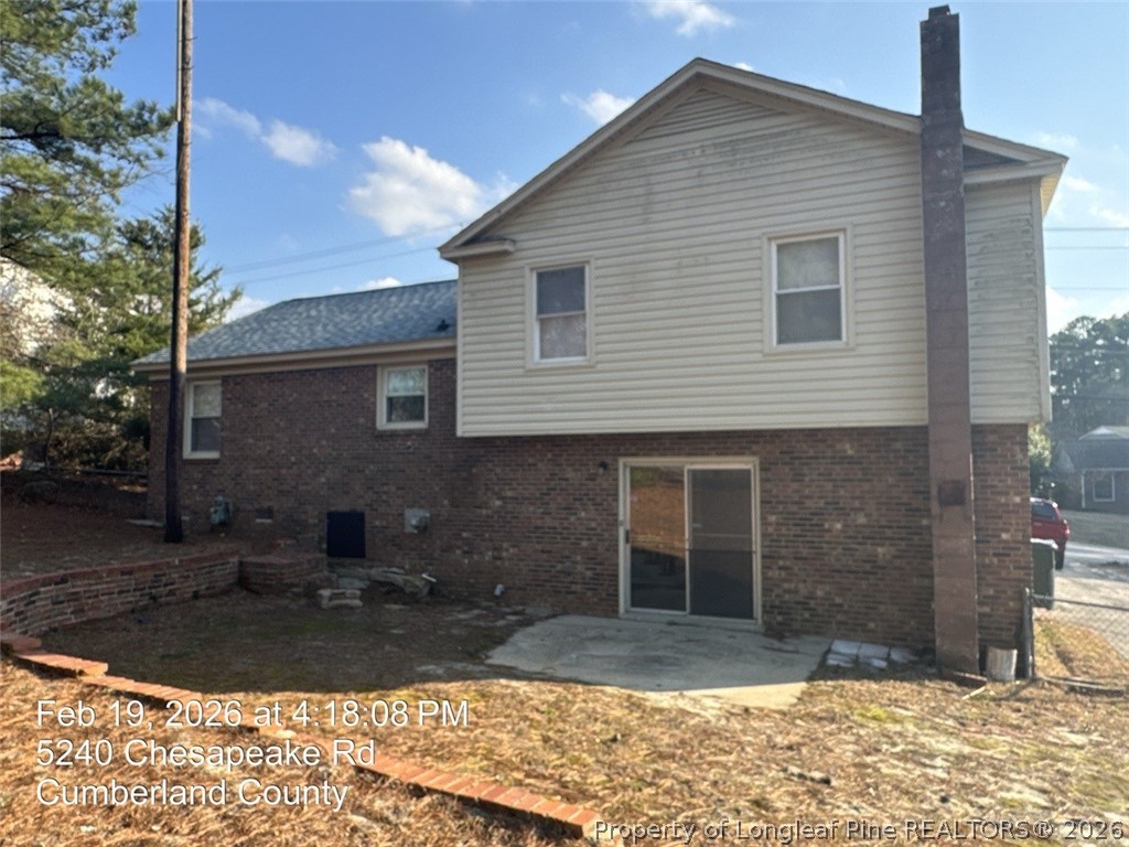 5240 Chesapeake Road Fayetteville, NC 28311 - Photo 2 of 20 a view of a house with yard and tree s