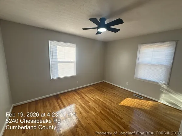 a view of an empty room and window