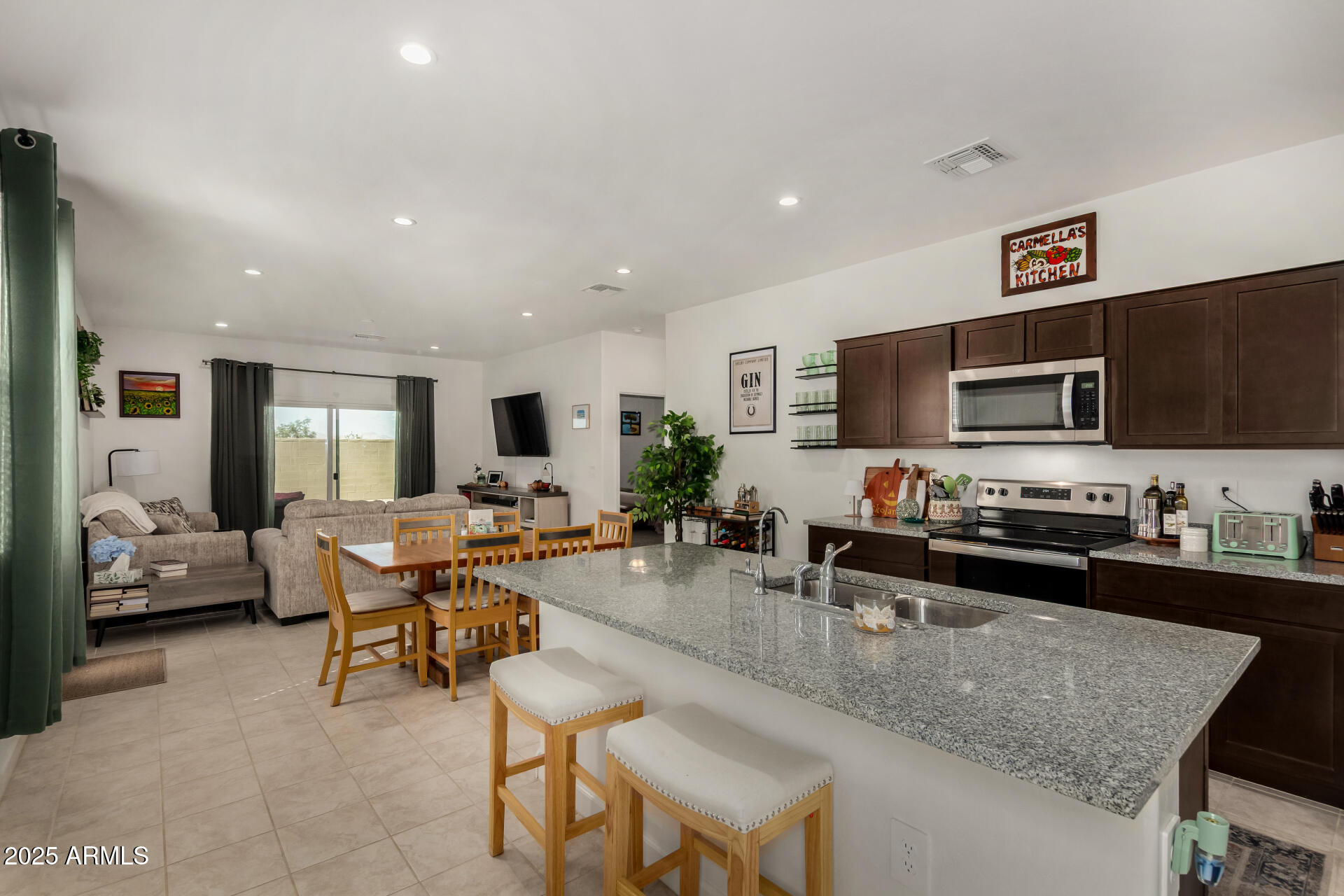 3226 West Stanton Avenue Apache Junction, AZ 85120 - Photo 11 of 34 a kitchen with counter space cabinets and appliances