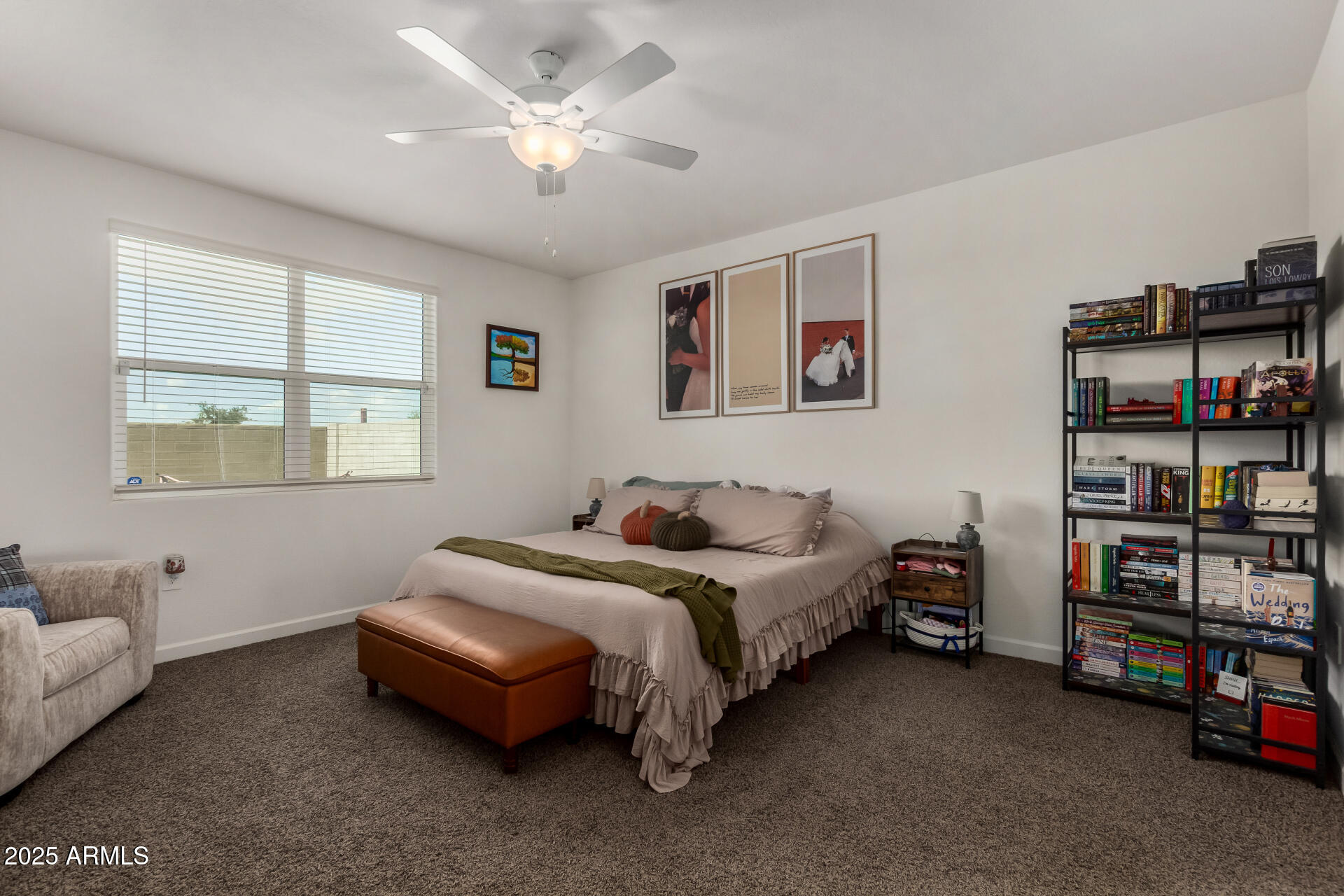 3226 West Stanton Avenue Apache Junction, AZ 85120 - Photo 14 of 34 a bedroom with a bed furniture and a window