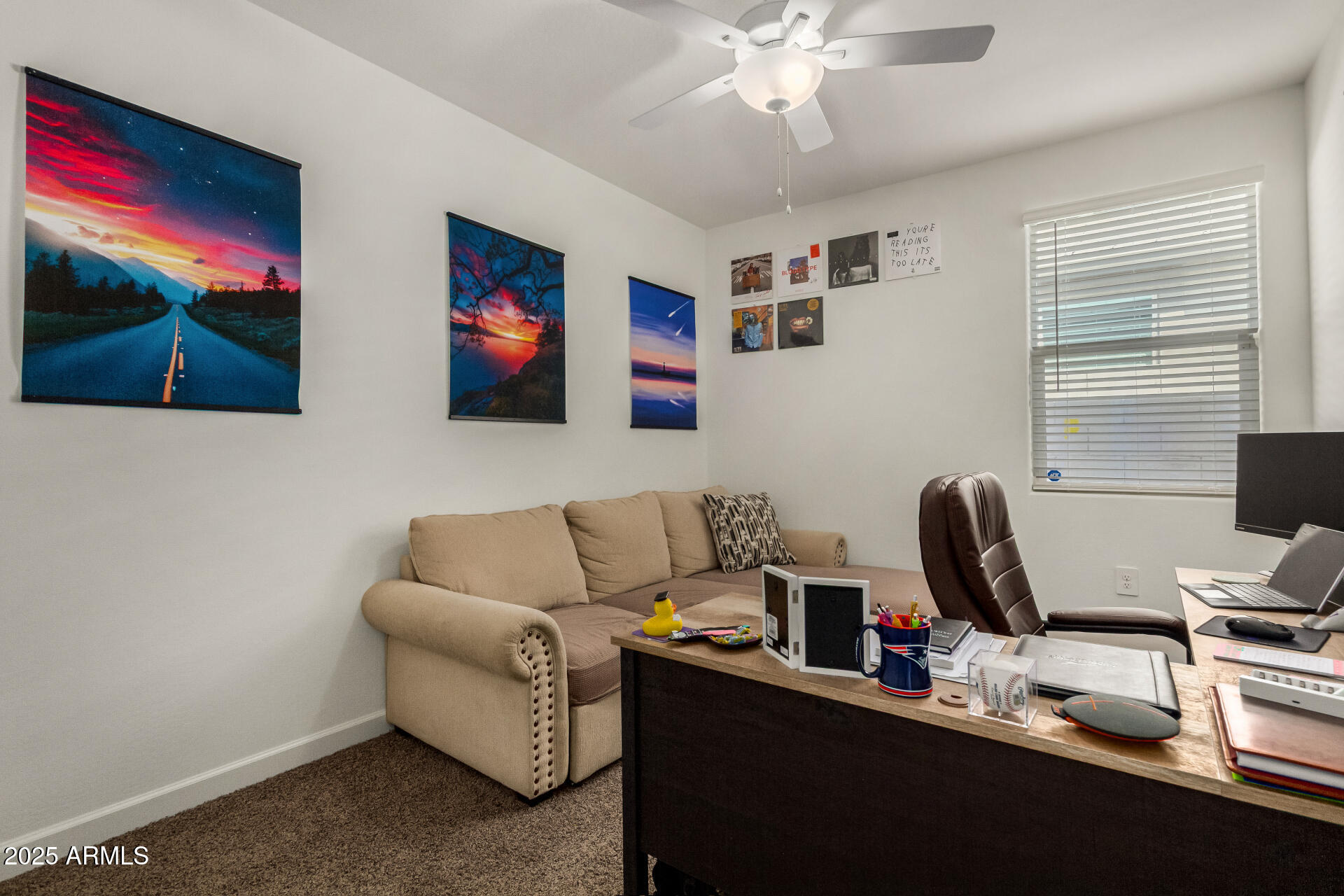 3226 West Stanton Avenue Apache Junction, AZ 85120 - Photo 22 of 34 a living room with furniture and a flat screen tv