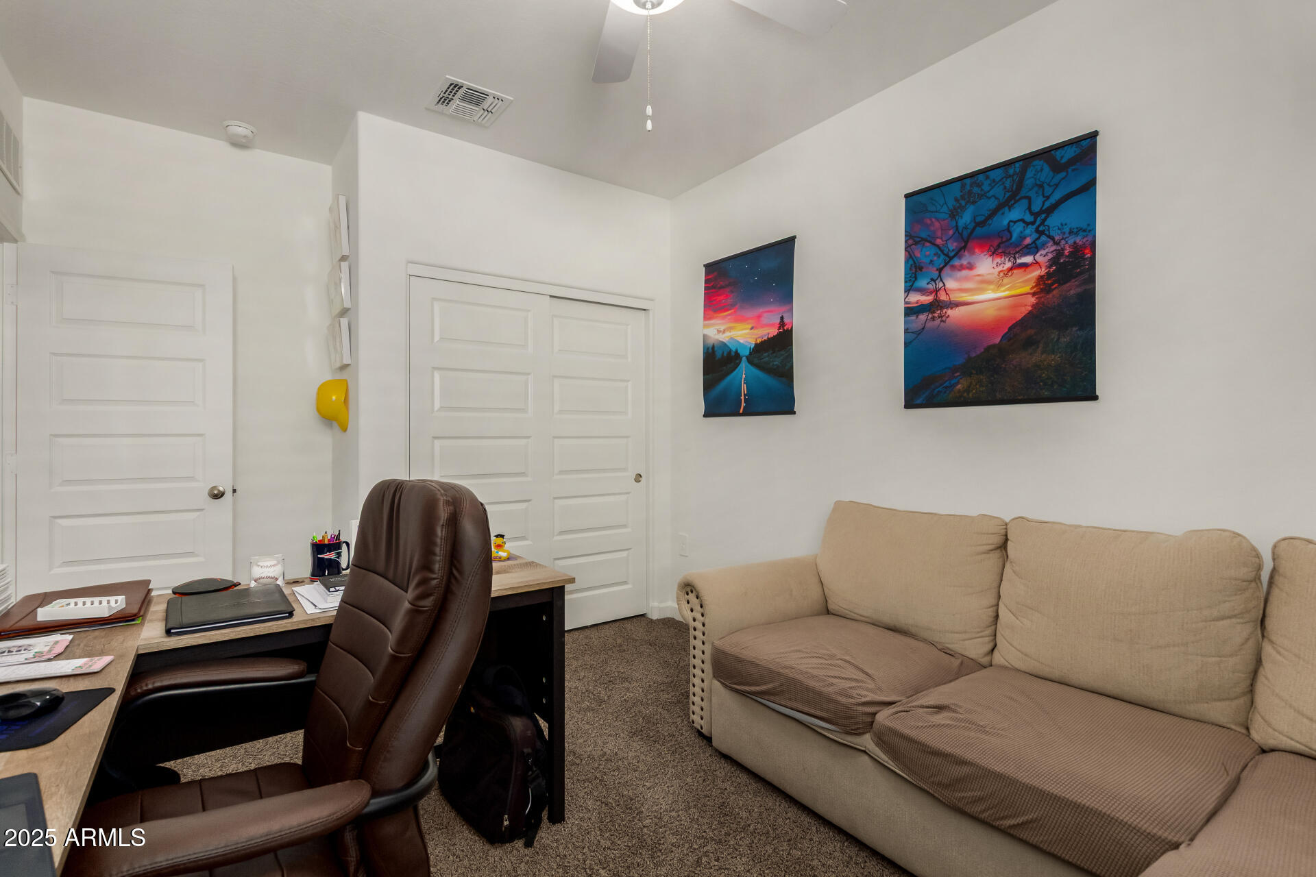 3226 West Stanton Avenue Apache Junction, AZ 85120 - Photo 23 of 34 a living room with furniture and a work space