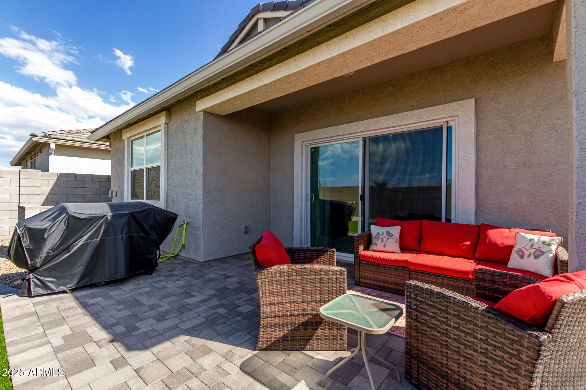 3226 West Stanton Avenue Apache Junction, AZ 85120 - Photo 29 of 34 a living room with furniture a rug and a potted plant