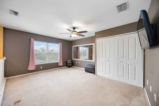 a view of a livingroom with a staircase
