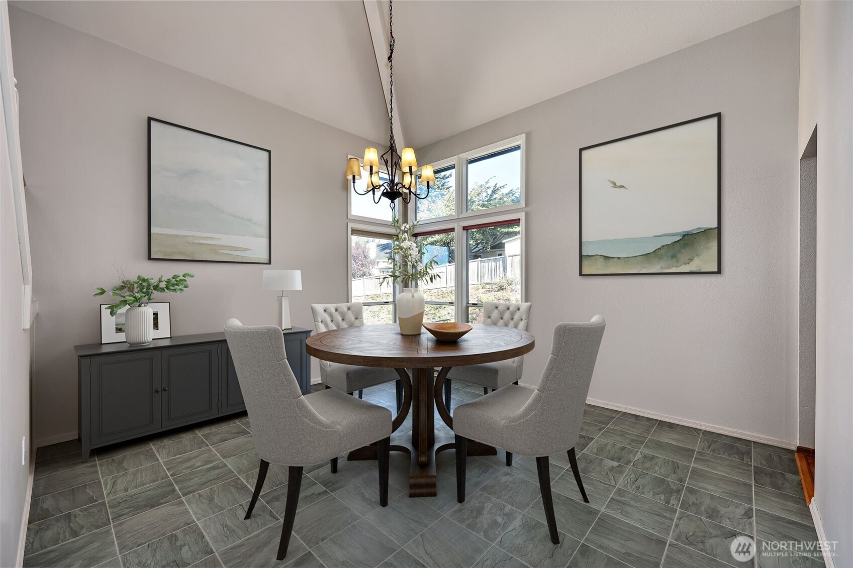 12281 Ridgepoint Circle Northwest Silverdale, WA 98383 - Photo 8 of 37 a view of a dining room with furniture window and wooden floor