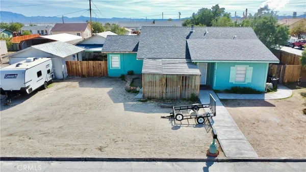 a aerial view of a house with sitting area
