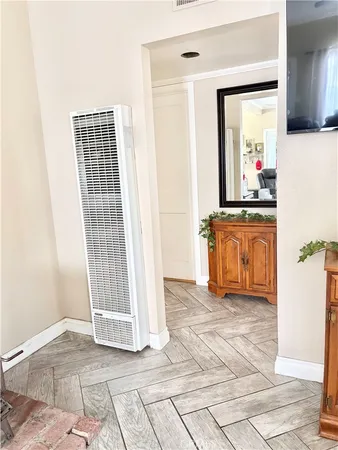 a view of a kitchen from the hallway