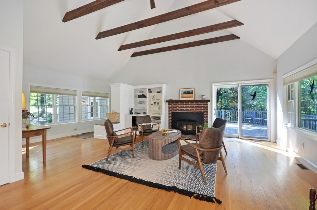 65 College Road Concord, MA 01742 - Photo 1 of 13 a living room with furniture and a fireplace
