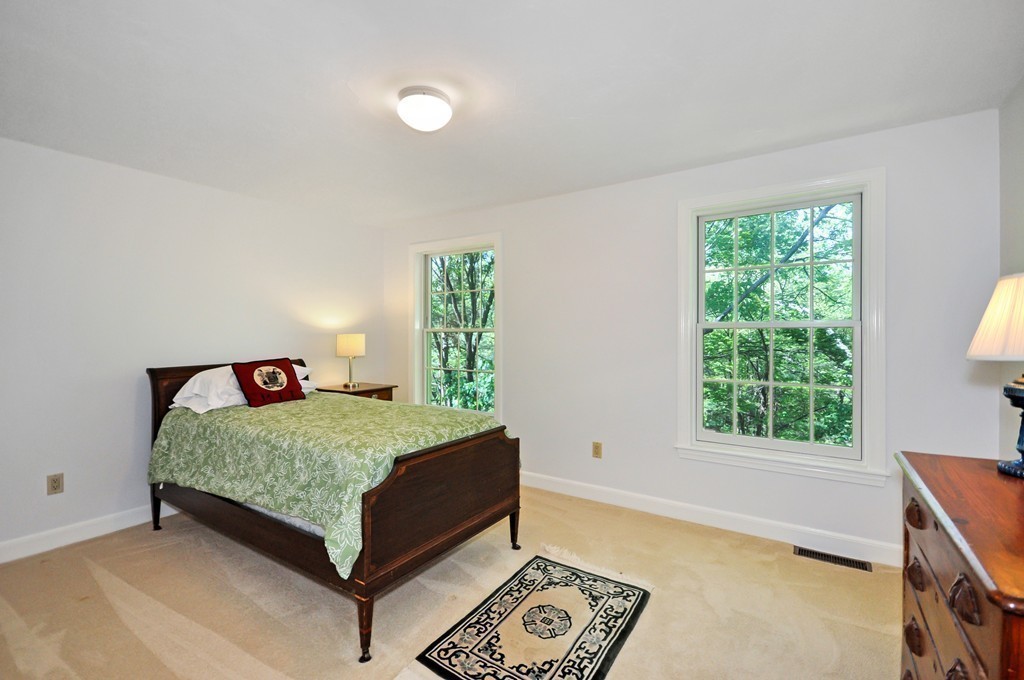 65 College Road Concord, MA 01742 - Photo 11 of 13 a bedroom with a bed and a window