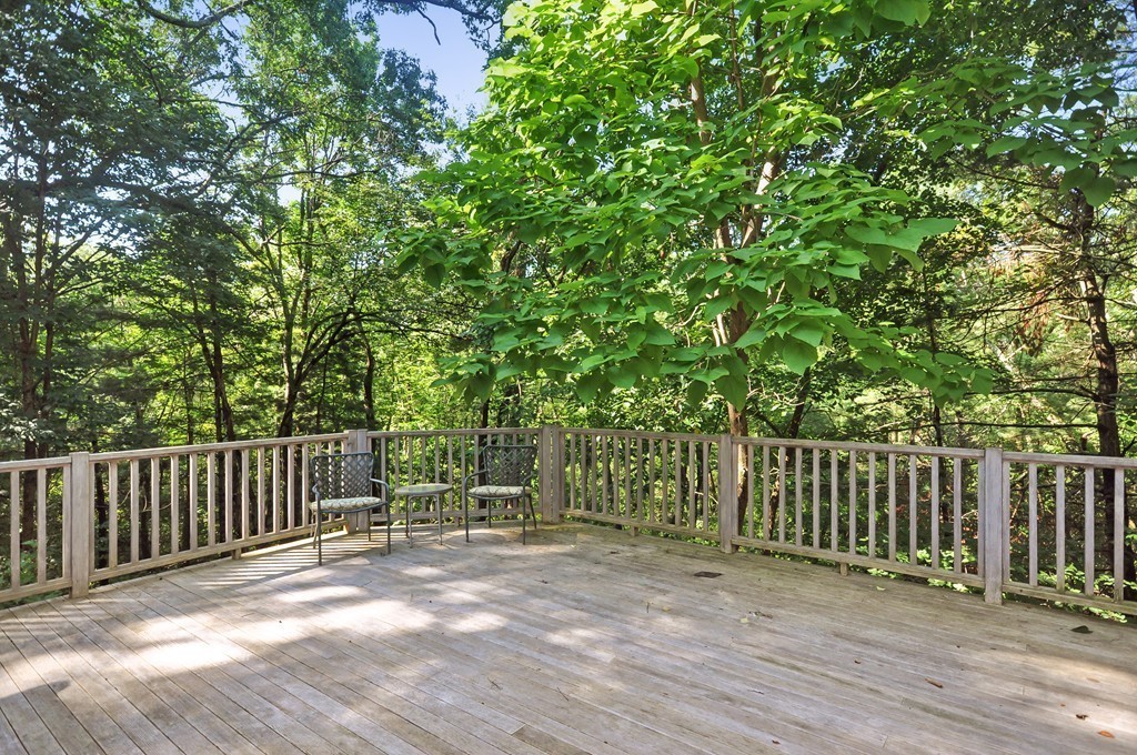65 College Road Concord, MA 01742 - Photo 13 of 13 a view of a deck with wooden fence and floor