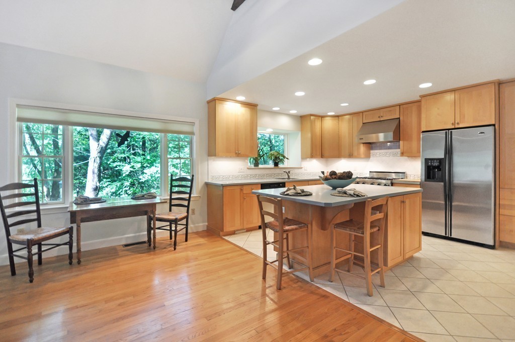 65 College Road Concord, MA 01742 - Photo 4 of 13 a kitchen with a sink stove and cabinets