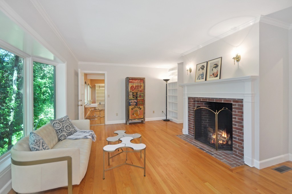 65 College Road Concord, MA 01742 - Photo 6 of 13 a living room with furniture and a fireplace