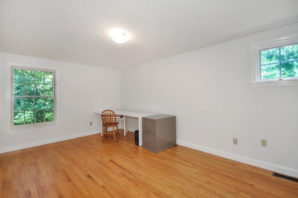 65 College Road Concord, MA 01742 - Photo 10 of 13 a view of a room with wooden floor and windows
