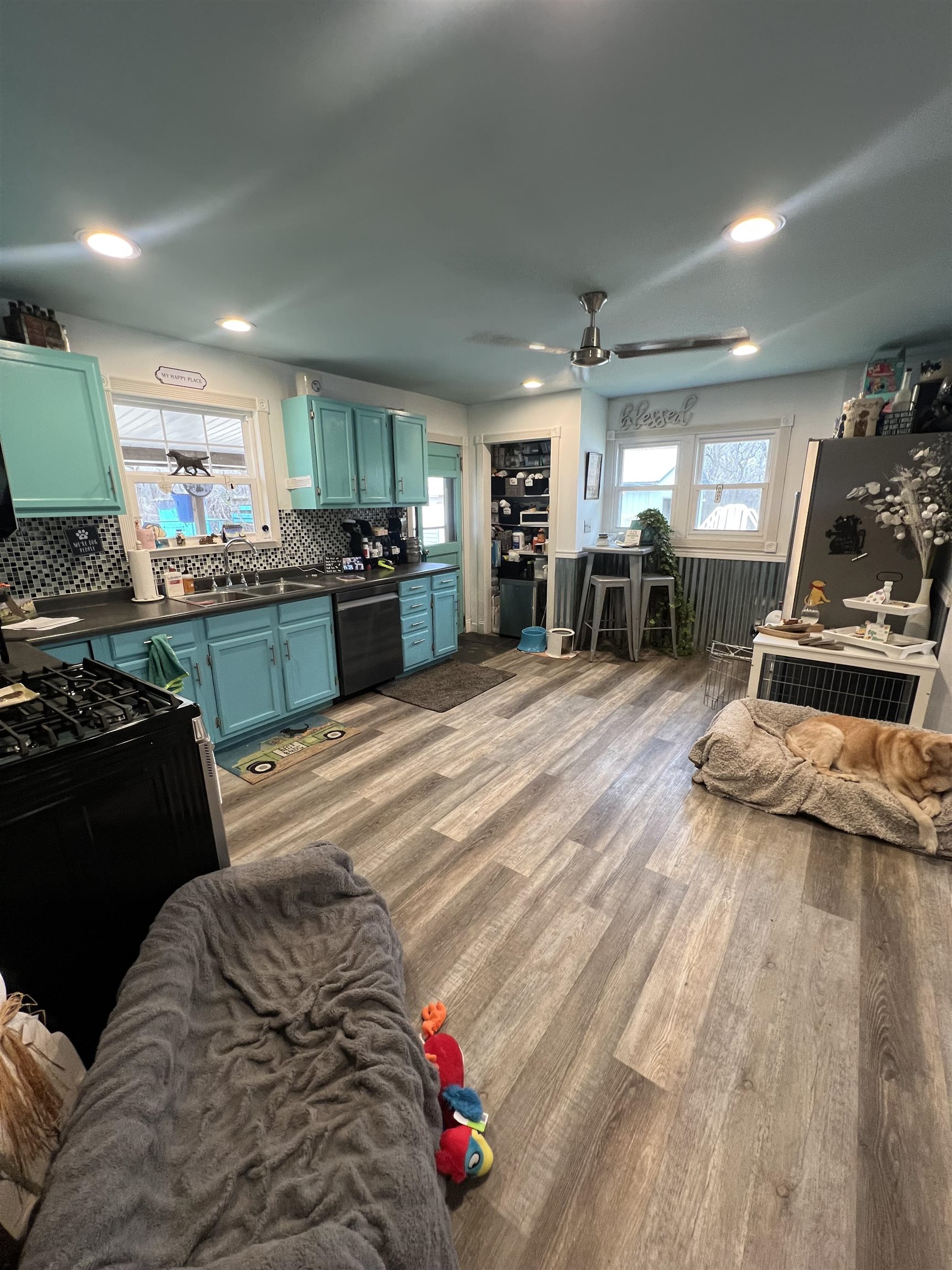 11371 Havenswood Road Roscoe, IL 61073 - Photo 15 of 24 a kitchen with microwave a stove and cabinets