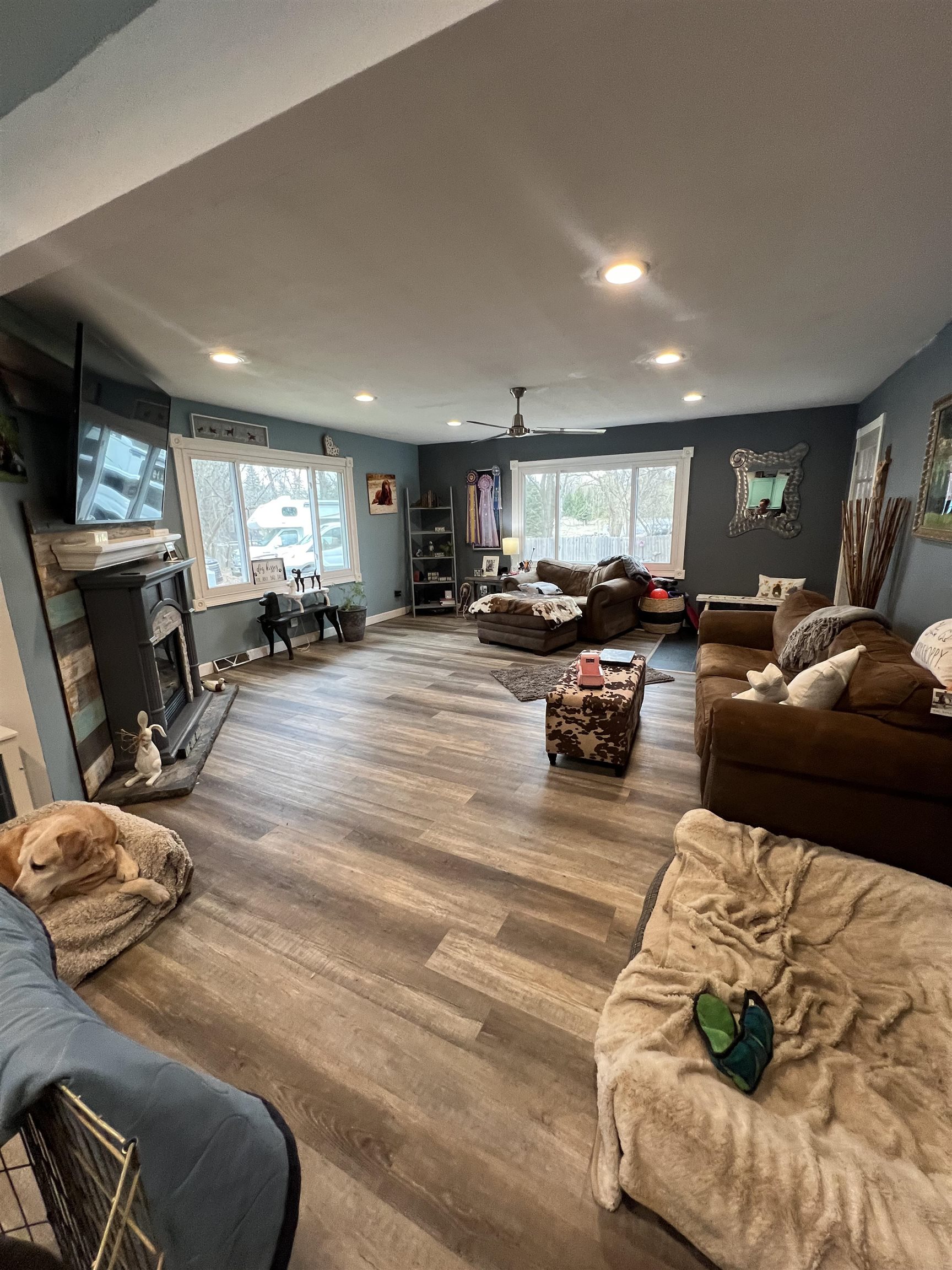 11371 Havenswood Road Roscoe, IL 61073 - Photo 17 of 24 a living room with furniture window and a flat screen tv