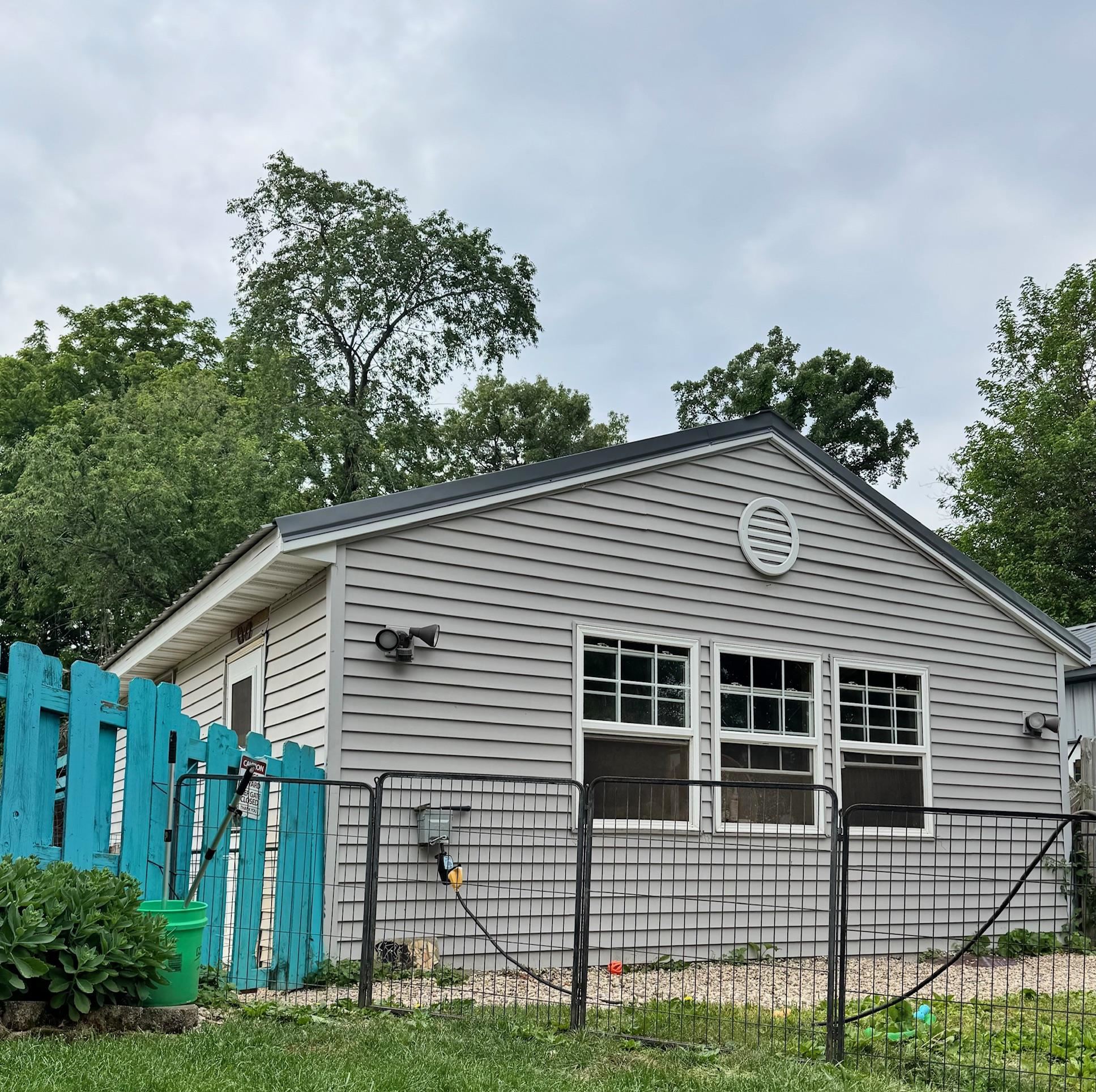 11371 Havenswood Road Roscoe, IL 61073 - Photo 8 of 24 a view of a house with a yard