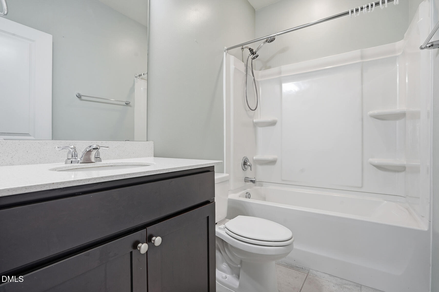 2116 Water Marsh Trail Fuquay-Varina, NC 27526 - Photo 15 of 28 a bathroom with a sink a toilet and a bathtub