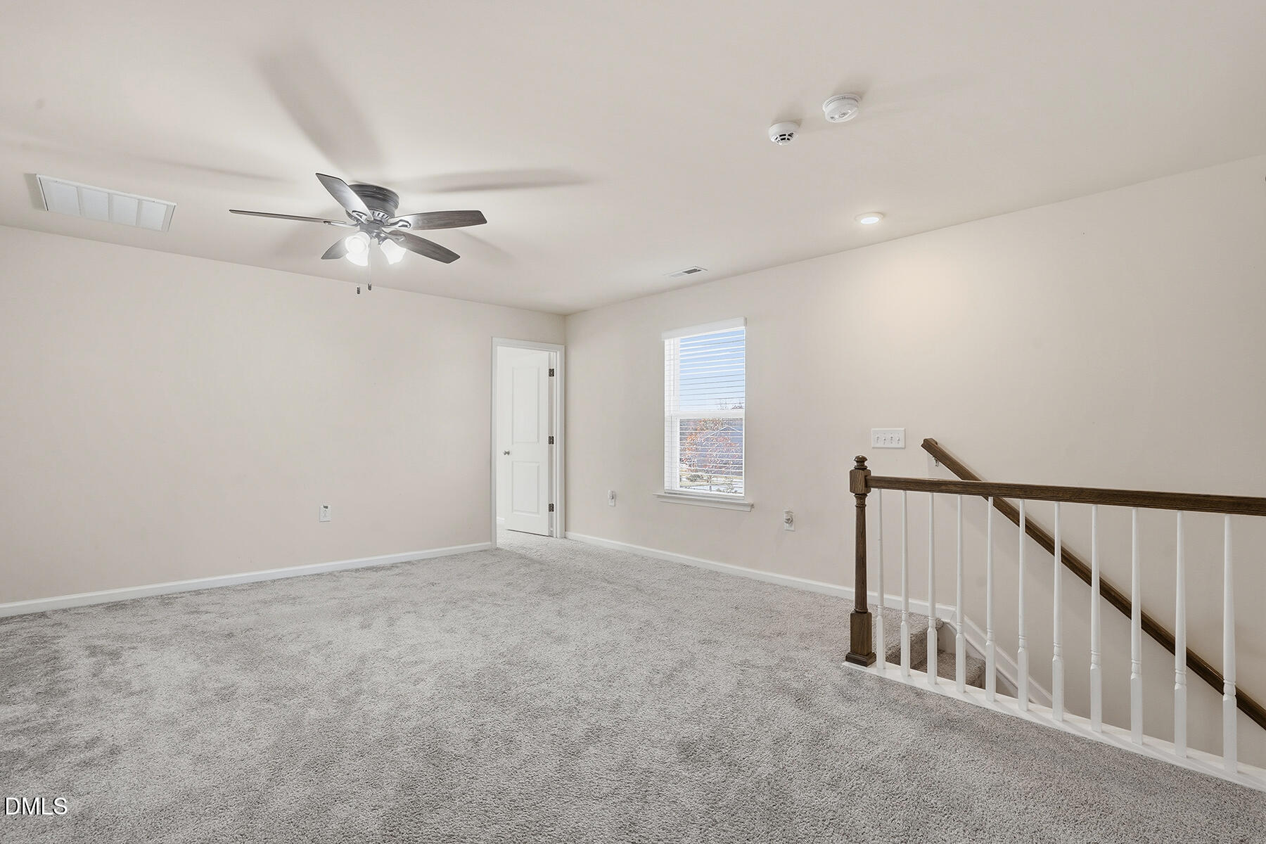 2116 Water Marsh Trail Fuquay-Varina, NC 27526 - Photo 17 of 28 a view of an empty room with a window