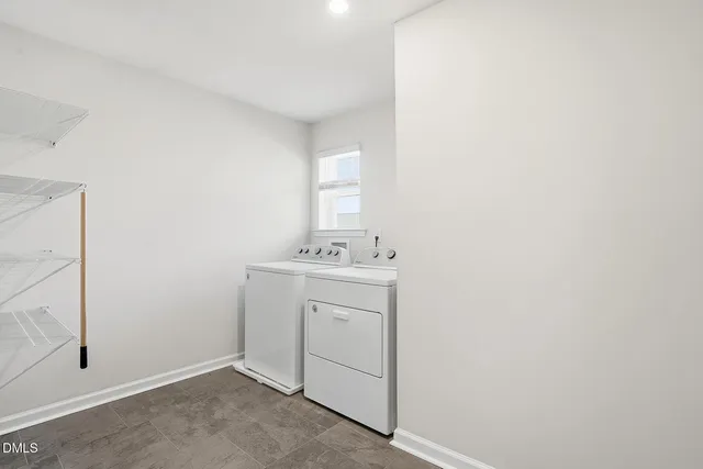 a room with a sink and a mirror