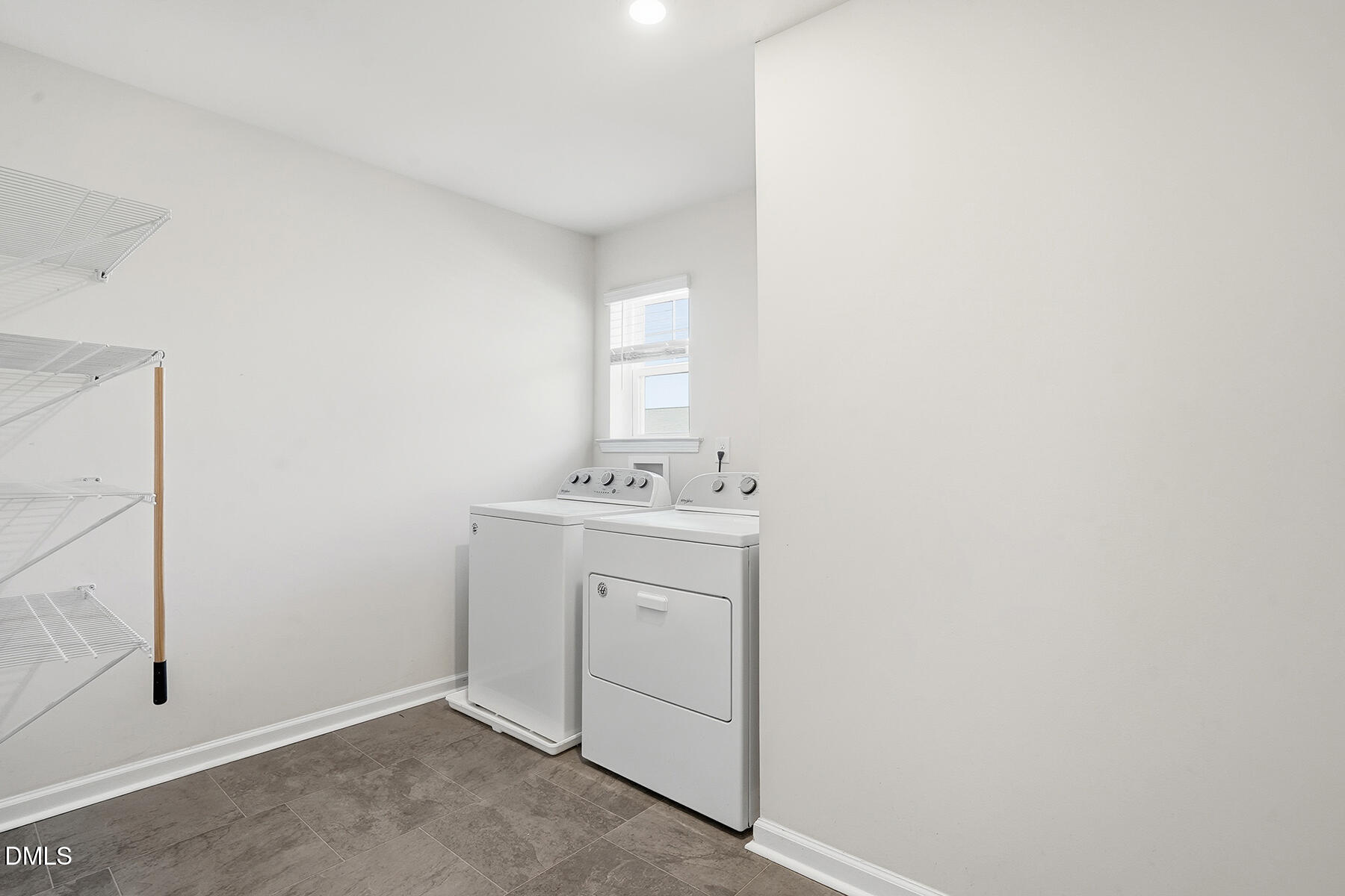 2116 Water Marsh Trail Fuquay-Varina, NC 27526 - Photo 18 of 28 a room with a sink and a mirror