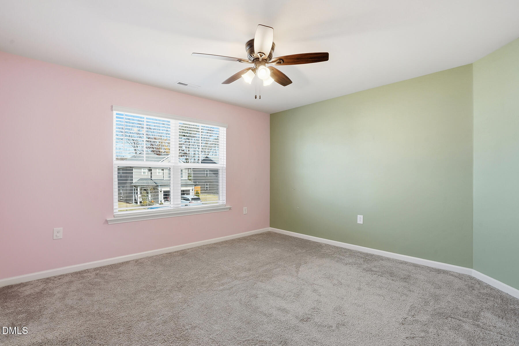2116 Water Marsh Trail Fuquay-Varina, NC 27526 - Photo 19 of 28 an empty room with window and ceiling fan